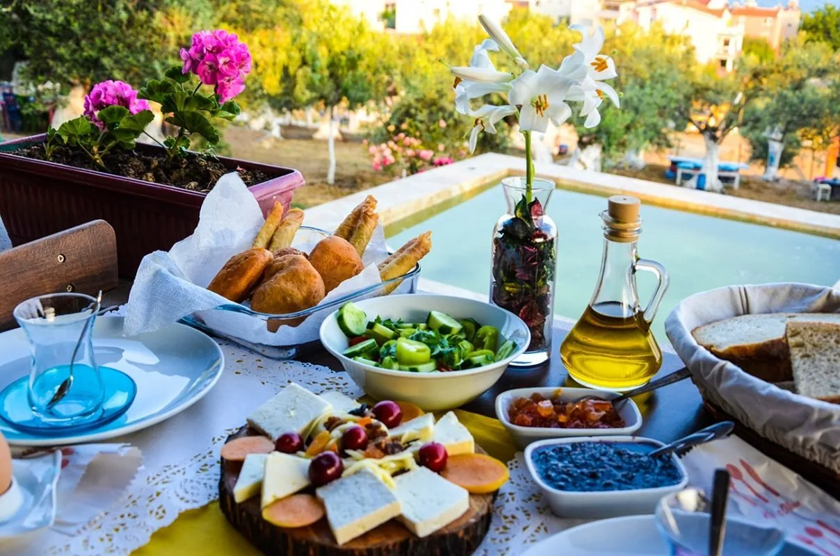 Breakfast by the pool: fresh bread, olive oil and a cheese plate